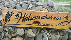 Carved wooden sign Watsons whakata 120cm x 30cm x 5cm