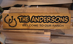 andersons wooden sign for there horse ranch H3 pine