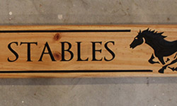 aroha stables sign long pine carved sign