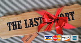 wooden sign wraped in red bow